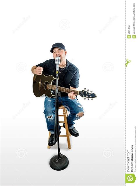 Acoustic Guitarist Singing And Strumming