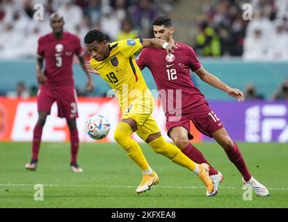 AL KHOR L R Karim Boudiaf Of Qatar Michael Estrada Of Ecuador