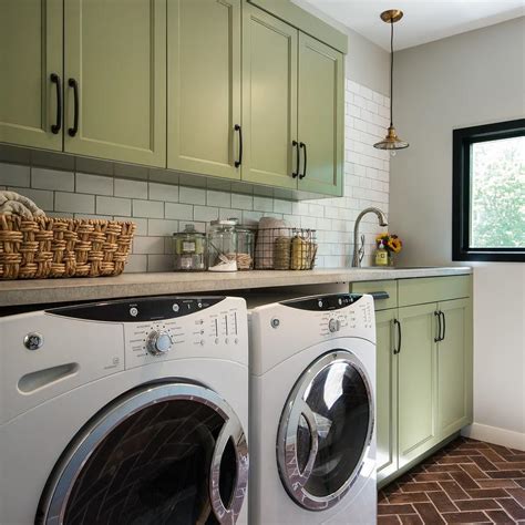 Green Shaker Laundry Cabinets With Red Brick Herringbone Pavers