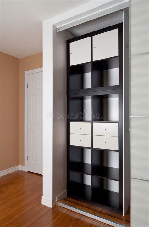 Built-in Closet With Sliding Door Shelving Storage Organization Stock ...