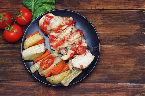 Healthy Food Grilled Chicken With Vegetables On A Wooden Board With