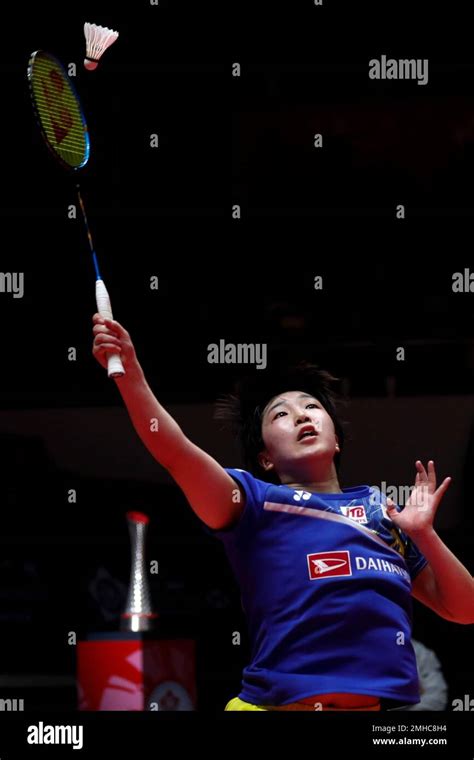 Akane Yamaguchi Of Japan Hits A Return Shot Against He Bing Jiao Of