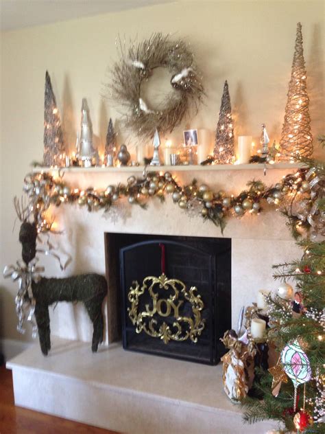 Holiday Mantel With Silver And Gold This Year Holiday Mantel Holiday