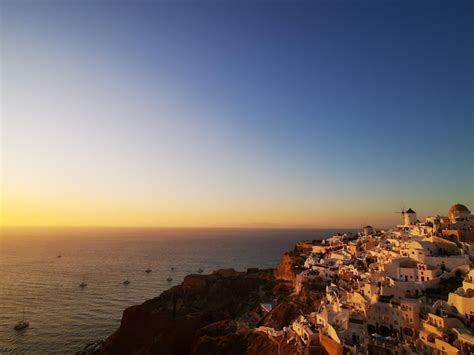 Premium Photo | Aerial view of oia during sunset