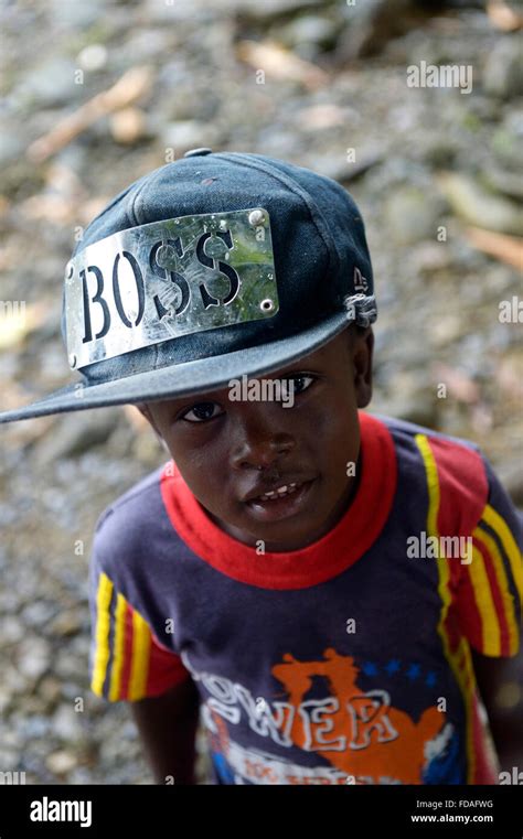 Boy With Hat By Boss Afro Columbian Village Of Playa Bonita On The