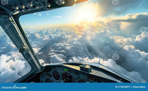 A Pilot is View from the Cockpit of an Airplane Flying Above the Clouds ...