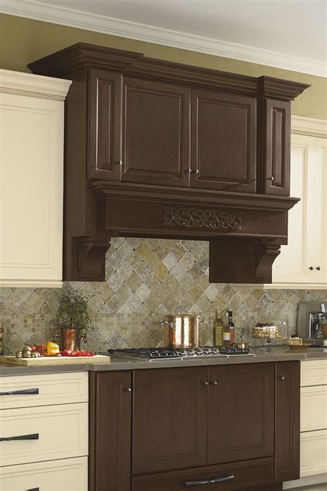 Wood Hood With Celtic Corbel And Onlay Dynasty Omega Cabinetry