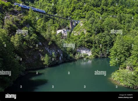 Vigezzina Train On A Bridge Over The River Melezza Borgnone Canton