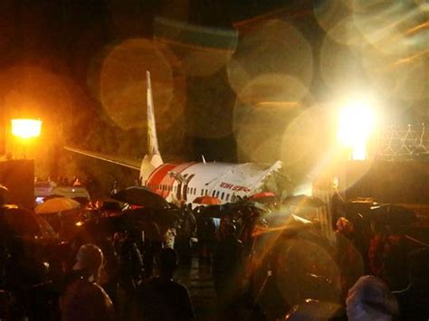 Pictures Dubai Kerala Air India Express Flight Crashes Splits Into