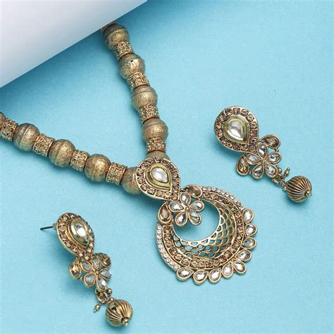 Buy PANASH Gold Plated White Kundan Studded Beaded Handcrafted