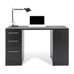 A Desk With A Computer On It And A Lamp In Front Of The Desk Top