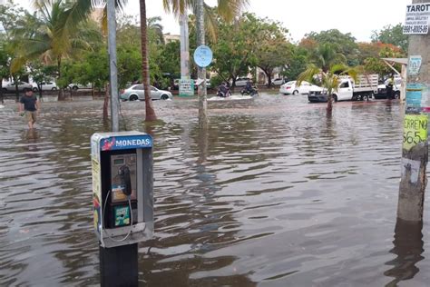 Fuertes lluvias provocan inundaciones en calles de Cancún FOTOS PorEsto