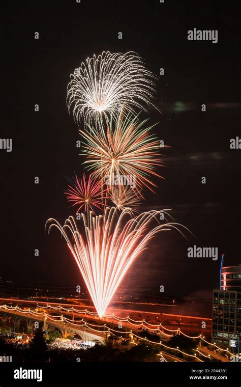 Fireworks over bridge at night Stock Photo - Alamy