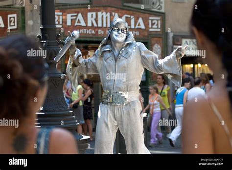 Las Ramblas Human Statue Street Performer With Shiny Silvery Elvis