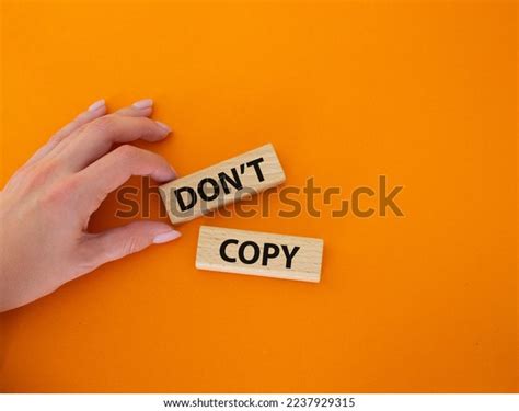 Dont Copy Symbol Wooden Blocks Words Stock Photo 2237929315 Shutterstock