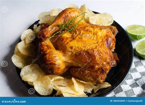 Tasty Roasted Chicken With Potato Chips Stock Photo Image Of Chips