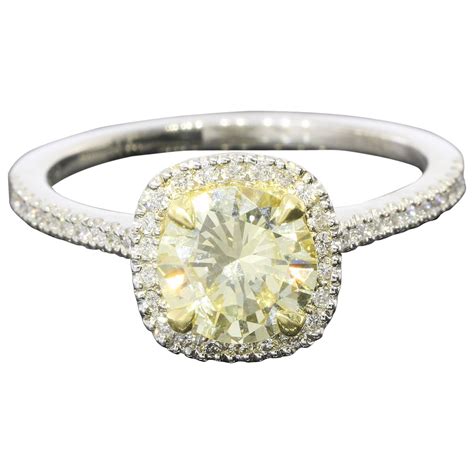 Fancy Light Yellow Canary Diamond Gold Platinum Halo Ring For Sale At