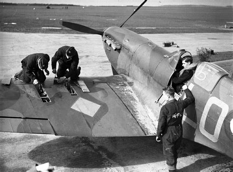 Ground Crew Rearm Spitfire Mk I Lo Q For Its Next Sortie At Raf Drem In