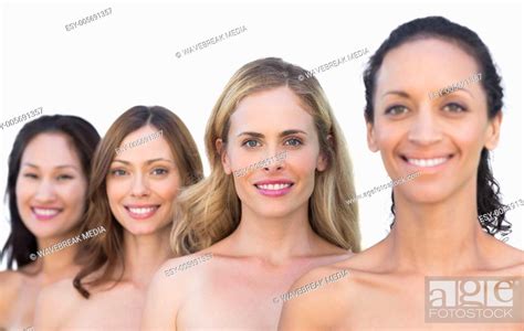 Smiling Nude Models Posing In A Line Looking At Camera Stock Photo