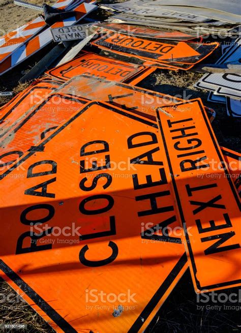 Orange Road Signs Stock Photo - Download Image Now - Barricade, Chaos, Construction Industry ...