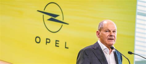 J Hriges Jubil Um Olaf Scholz Lobt Opel F R Kurs Bei Elektro