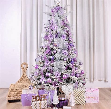 A Purple And Silver Christmas Tree Surrounded By Presents