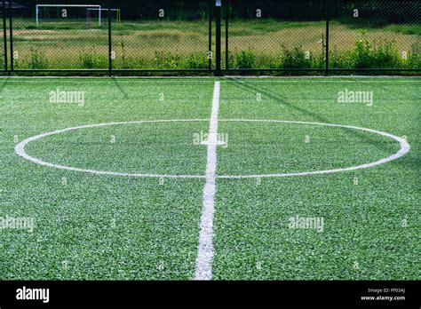 Artificial turf football field Stock Photo - Alamy