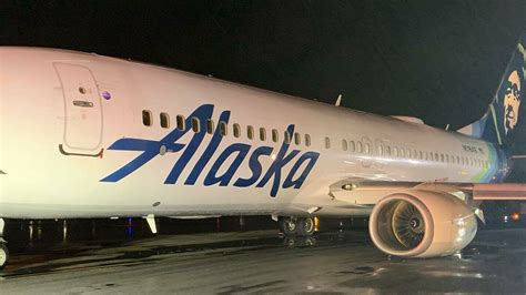 Alaska Airlines flight makes hard landing during California storms | WAMU