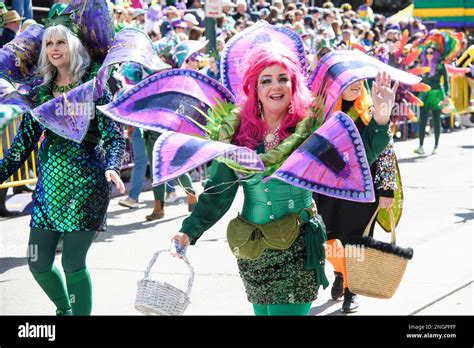 Parade goers are seen at the Krewe Of Iris parade on Saturday, Feb 18 ...