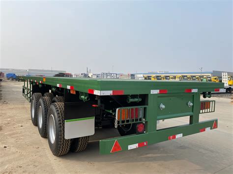 Tri Axles Flatbed Semi Trailer Shipping Container Transport Mic Low