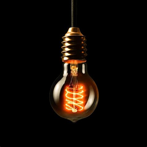 Premium Ai Image Light Bulb On Black Background