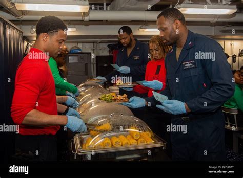 221027 N Yx844 1085 Philippine Sea Oct 27 2022 Sailors Receive An October Birthday Meal In