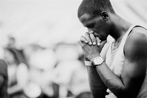 Man Praying Fountain Of Life Christian Center