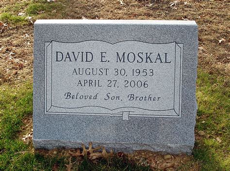 Single Slant Memorial Headstones With Contrasting Bible