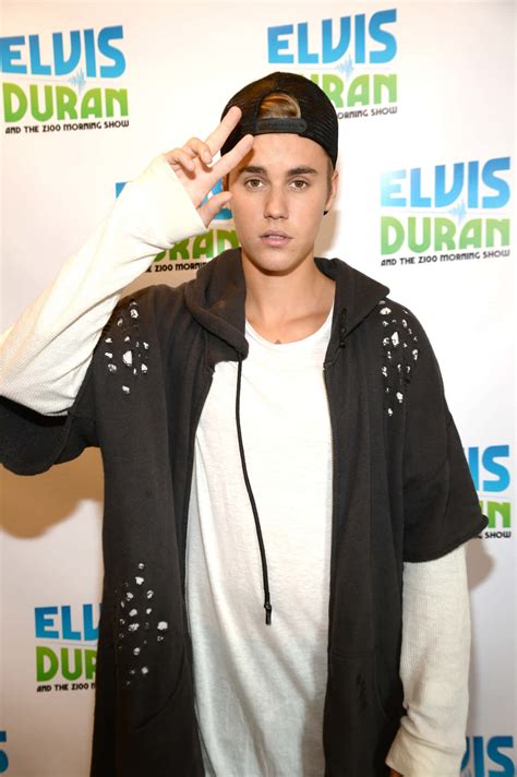 Download Justin Bieber poses for a picture in 2015 Wallpaper