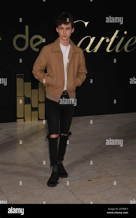 Troye Sivan Wearing Cartier Jewelry Arrives To The Cartier Los Angeles