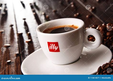 Composition With Cup Of Illy Coffee And Beans Editorial Photo Image