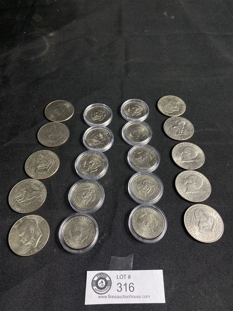 20 1970's U.S Dollar & 50 Cent Pieces, 10 Dollar Coins, 10 50 Cent Pieces