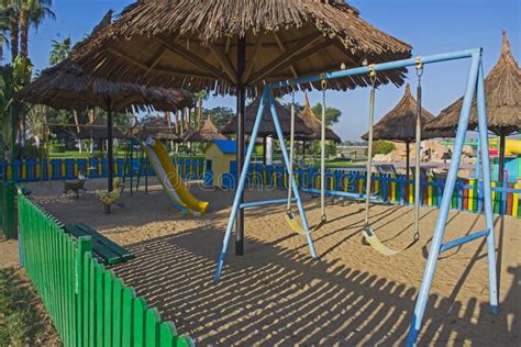 Childrens Swings Frame in Playground Area Stock Image - Image of ...