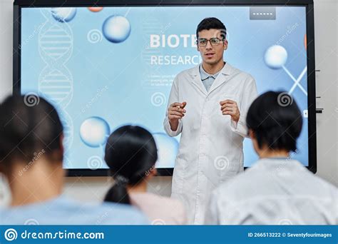 Male Doctor Giving Lecture Or Presentation At Medical Seminar Stock