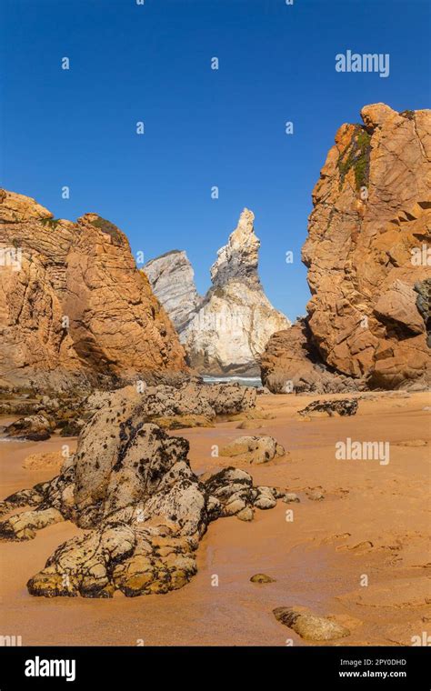 Towering Rock Cliffs At Praia Da Ursa Beach Sintra Portugal Atlantic