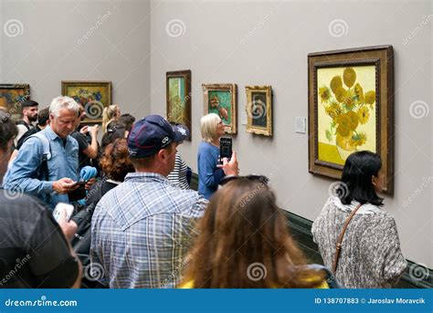 Visitor Making A Photos Of Vincent Van Gogh Painting In National