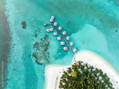 Aerial view of a luxury beach resort in the Maldives Stock Photo | Adobe Stock