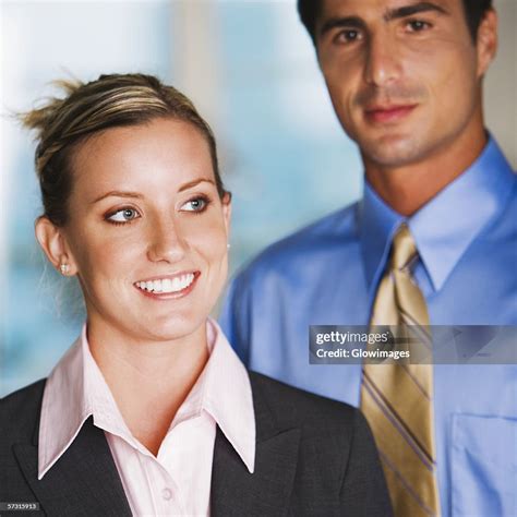 Closeup Of A Businessman And A Businesswoman High Res Stock Photo