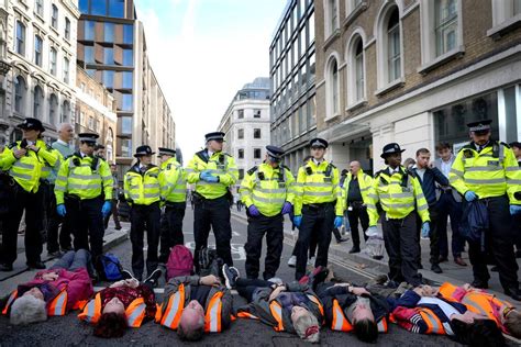 As Climate Protests Get Bolder, British Police Strike Back With New ...