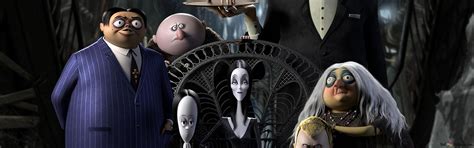 The Addams Family characters together 2K wallpaper download