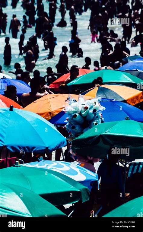 Crowd Of People At Leme And Copacabana Beach On A Hot Summer Day Rio De Janeiro Brazil Stock