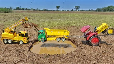 Tipper Truck Heavy Loaded Accident Pulling Out Mahindra Tractor And