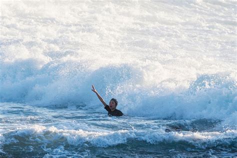 Dramatic Sea Rescue As Swimmer Saved By Lifeguards Seconds Before She