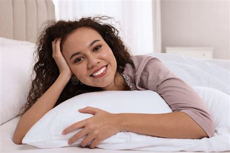 Happy African American Woman Lying On Bed At Home Stock Image Image